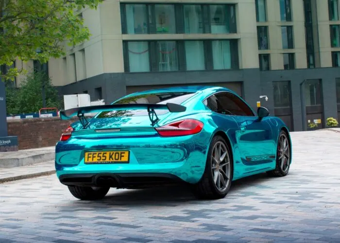 Porsche in light blue chrome wrap